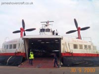 Bow ramp in the down position, as seen from the front of the craft. Cars, vans and coaches all load from here, as do the supplies trolleys for in-flight service such as those carrying the duty-free. The skirt in this picture is still slightly inflated as the craft had just arrived from France. Note the cars all facing away from the shot, ready to exit through the rear doors (pictured later).<br><br>Also note that the skirt appears to have a hole in it on both sides of the ramp. For correct alignment with the car deck, the ramp had to go through the level of the skirt (on Mk II and Mk III craft). For this, a closeable seam had to be added to the skirt to allow it to fold down whenever the ramp was lowered, yet seal up upon raising of the ramp.